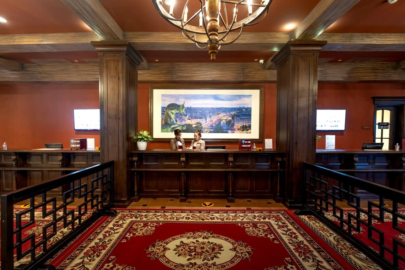 The reception desk of a hotel lobby
