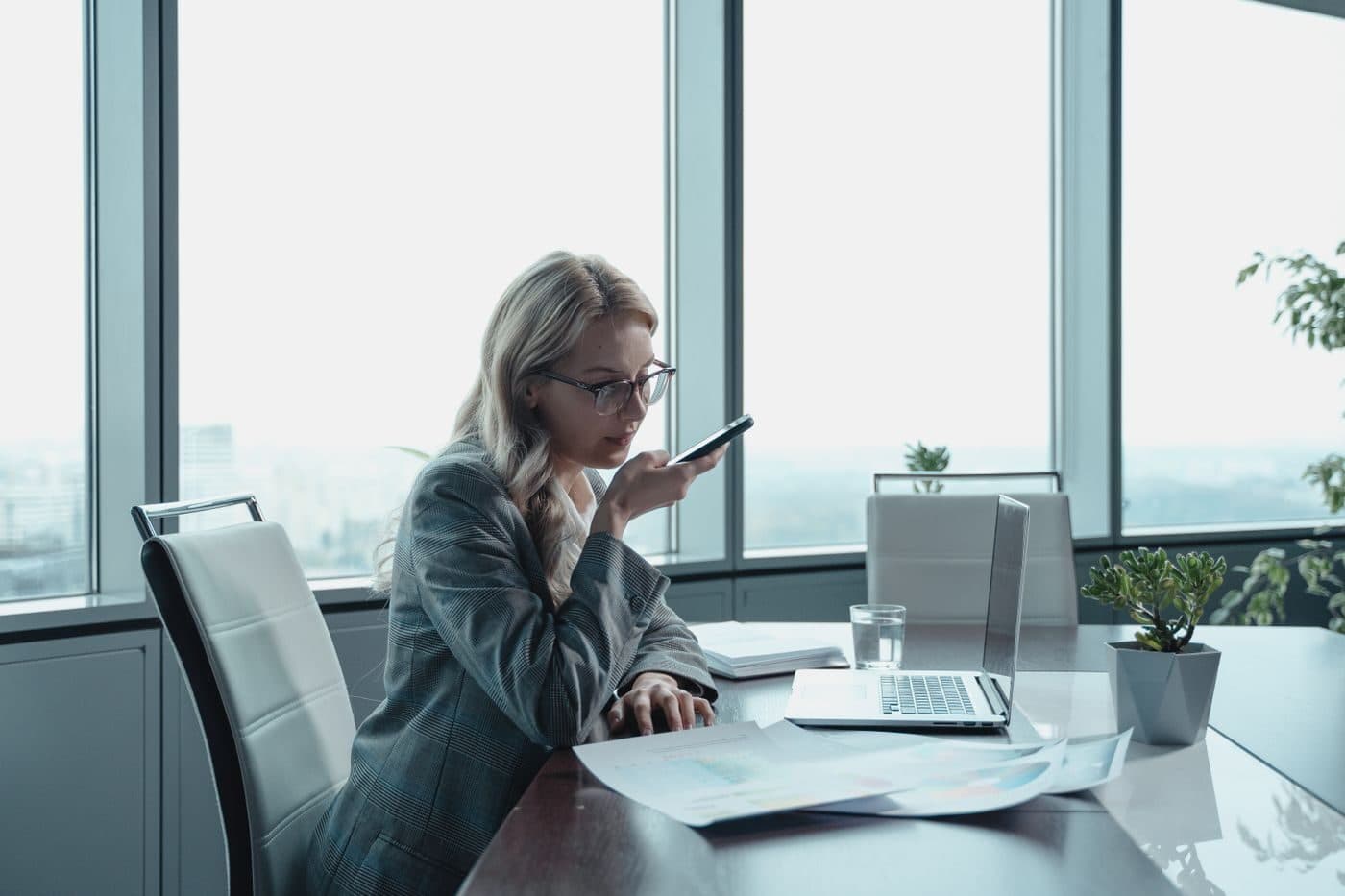 A member of an operations team on a call in a modern office