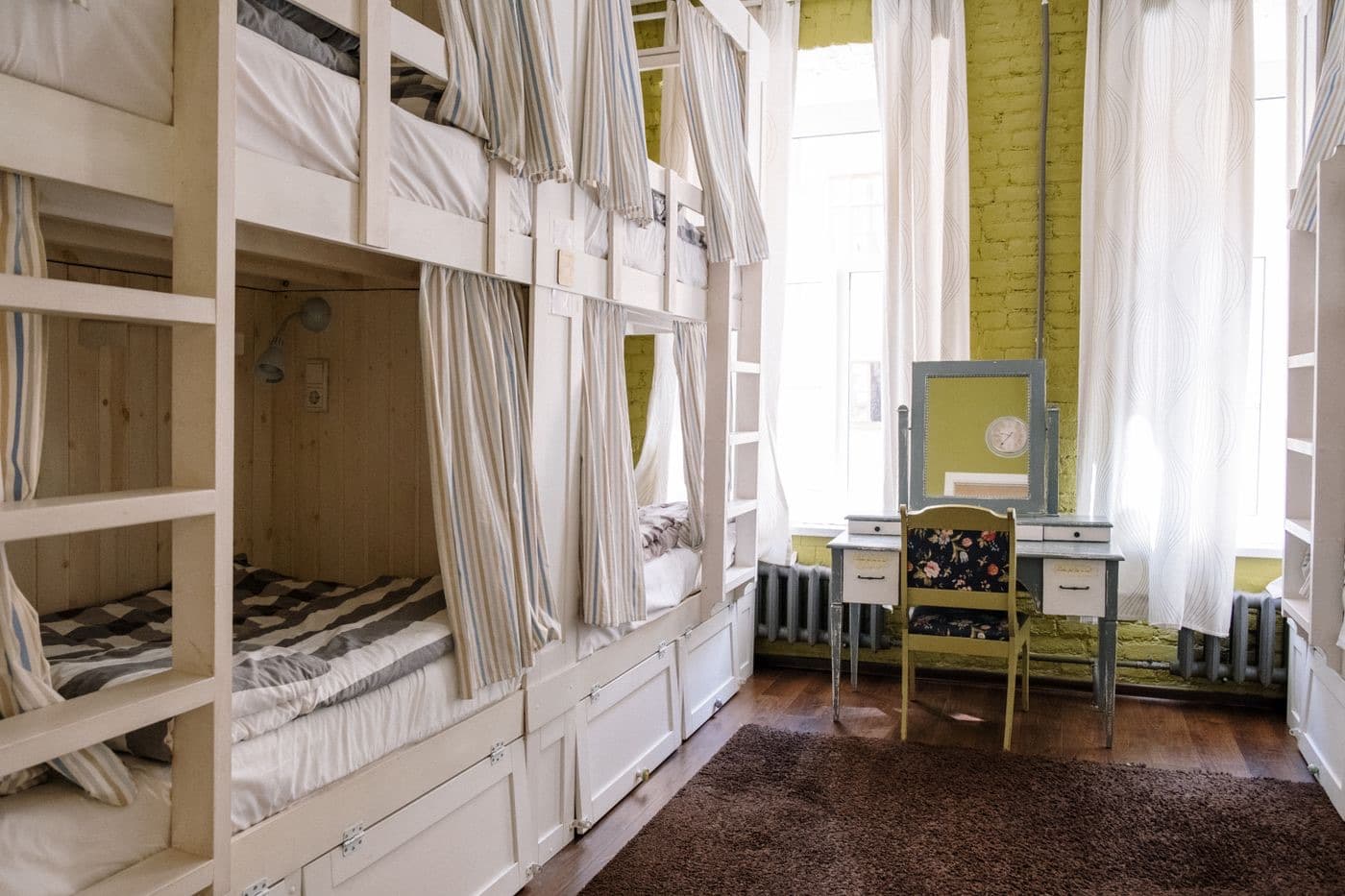 A comfortable hostel dorm room with clean bunk beds