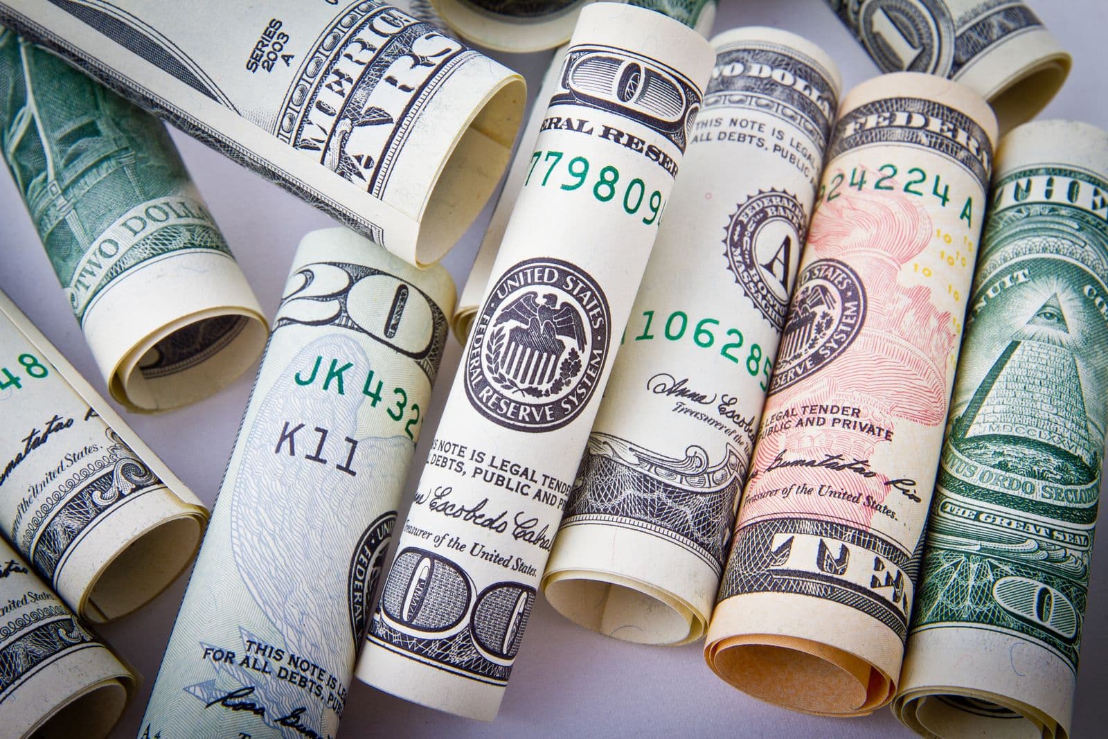 Banknotes from several countries laid out together
