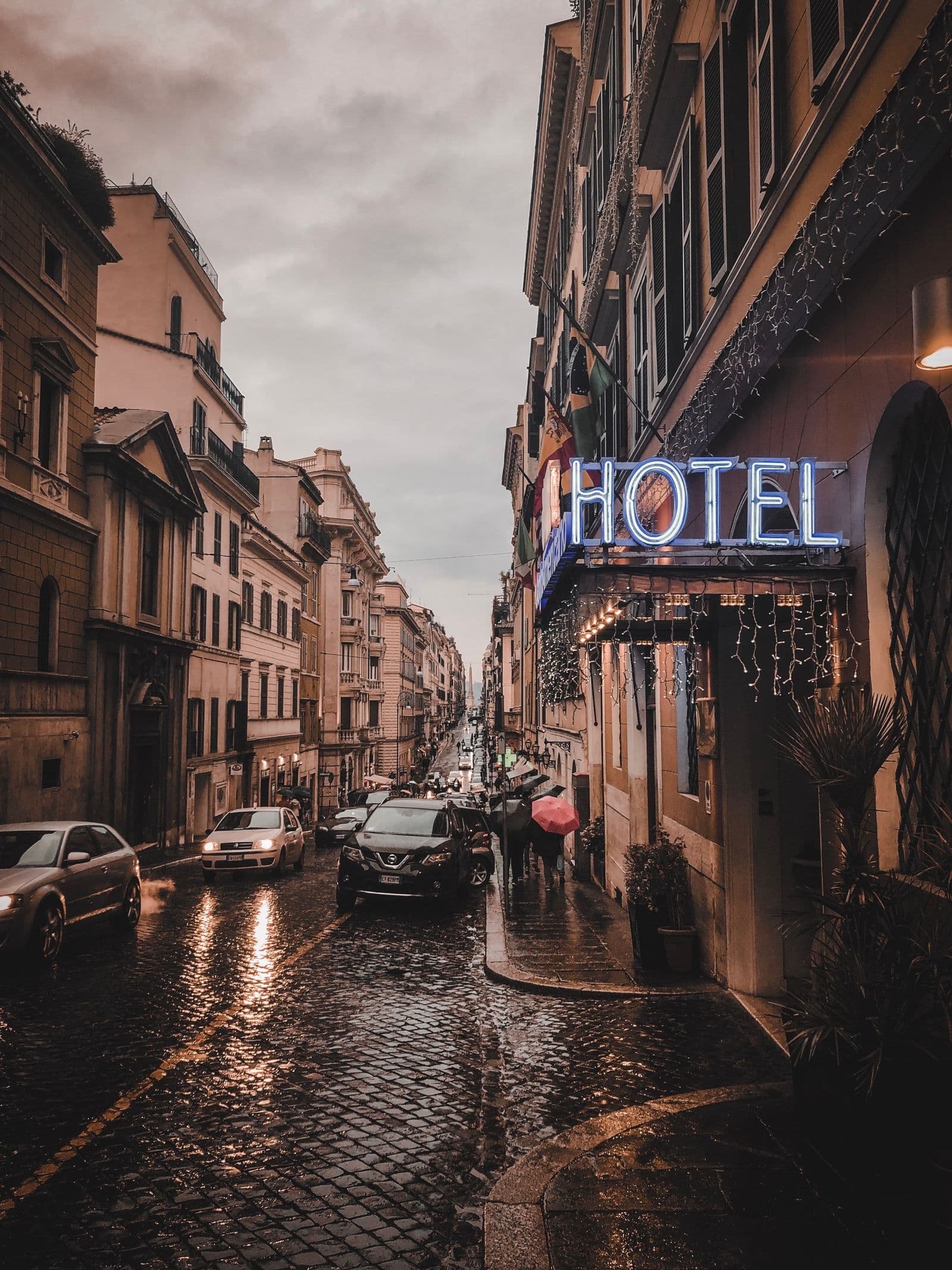 A city street at night in the rain